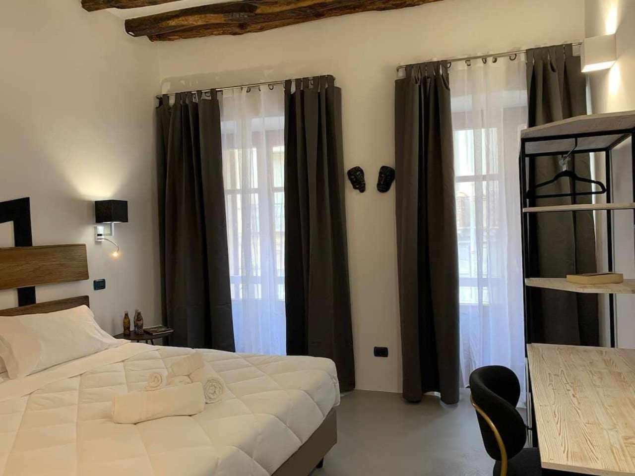C&O Savoia Deluxe Rooms Cagliari Esterno foto